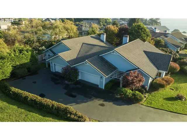 a black and white photo of a house