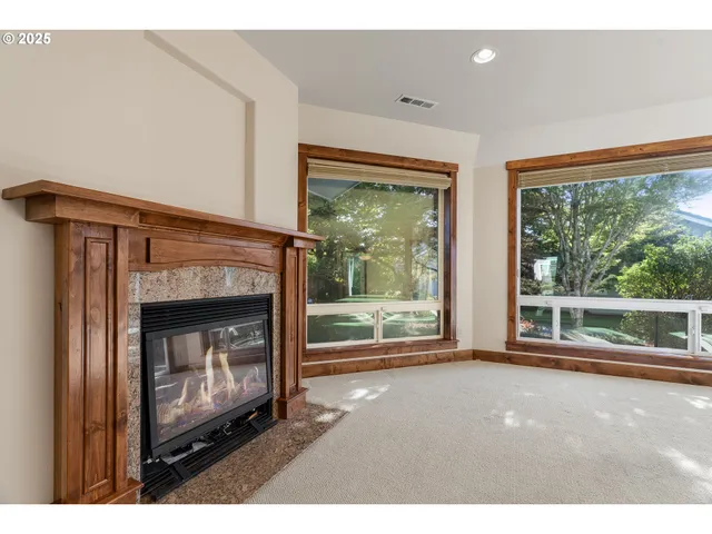 a living room with a fireplace