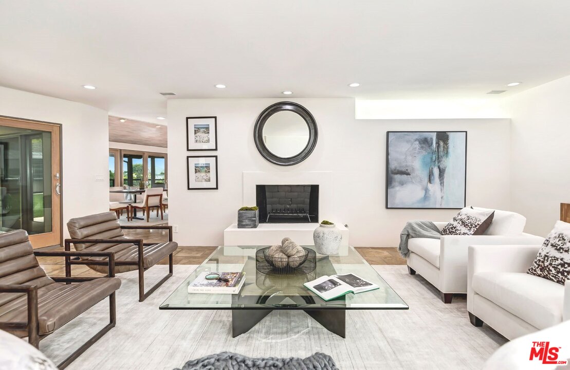 2205 Stradella Road Los Angeles, CA 90077 - Photo 14 of 53 a living room with furniture wooden floor and window