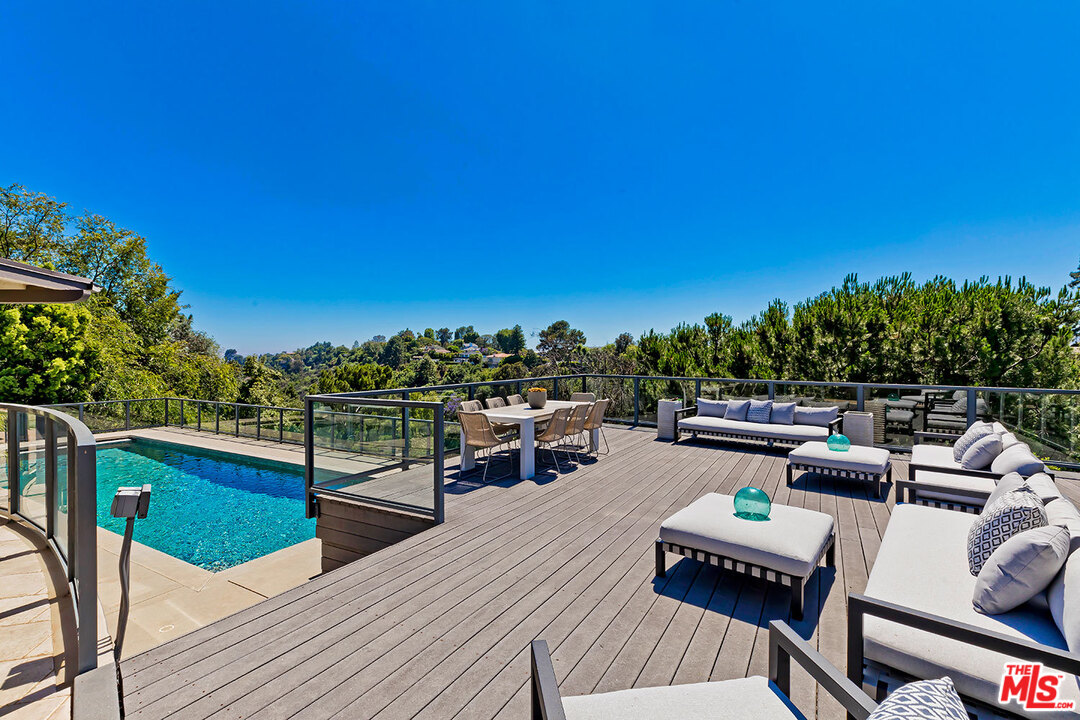 2205 Stradella Road Los Angeles, CA 90077 - Photo 28 of 53 a view of a terrace with furniture