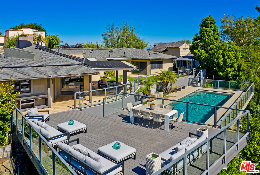2205 Stradella Road Los Angeles, CA 90077 - Photo 32 of 53 an aerial view of a house with swimming pool and furniture