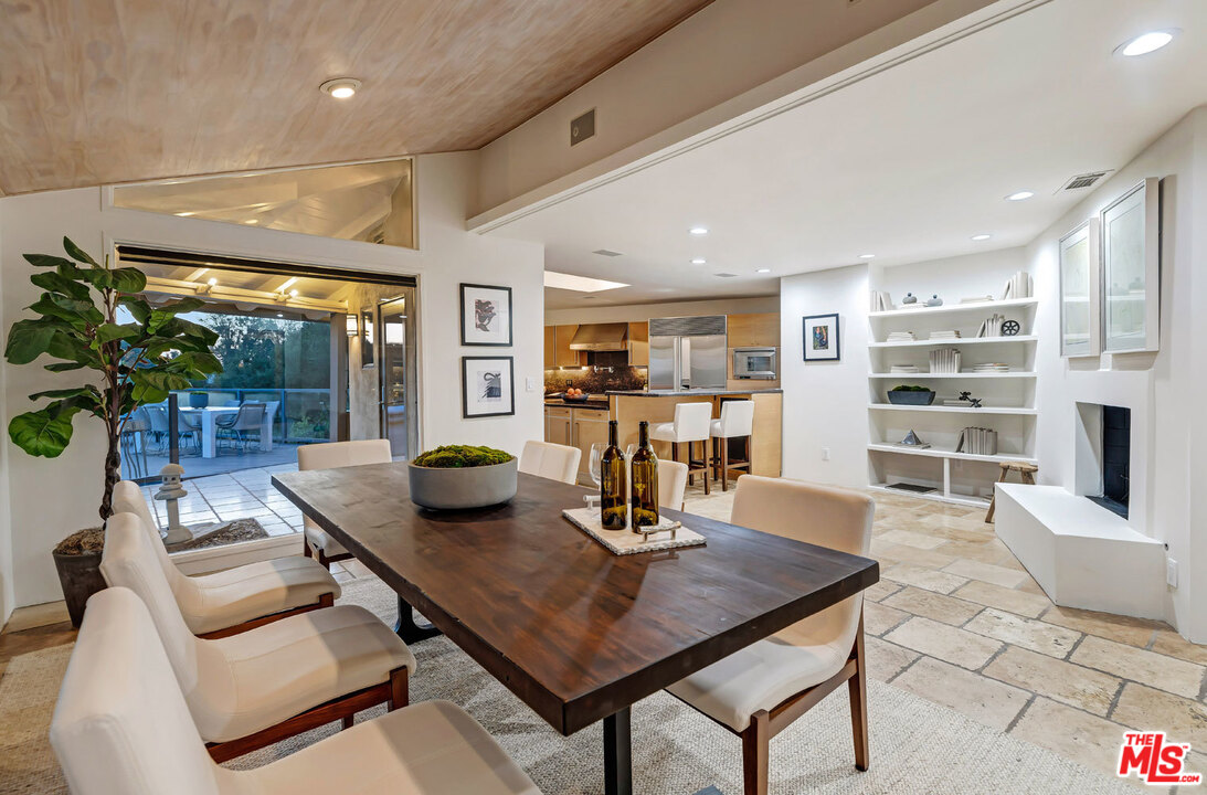 2205 Stradella Road Los Angeles, CA 90077 - Photo 47 of 53 a view of a dining room and livingroom view