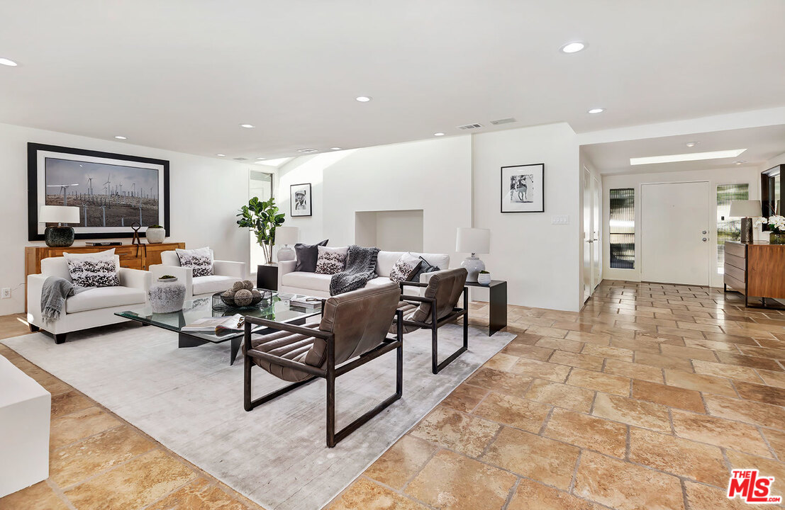 2205 Stradella Road Los Angeles, CA 90077 - Photo 10 of 53 a living room with furniture