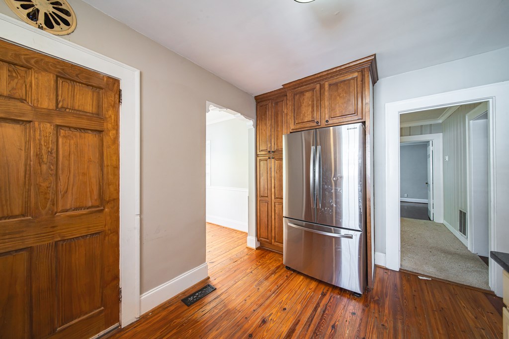 1705 Slade Drive Columbus, GA 31901 - Photo 13 of 37 a view of empty room with wooden floor and window