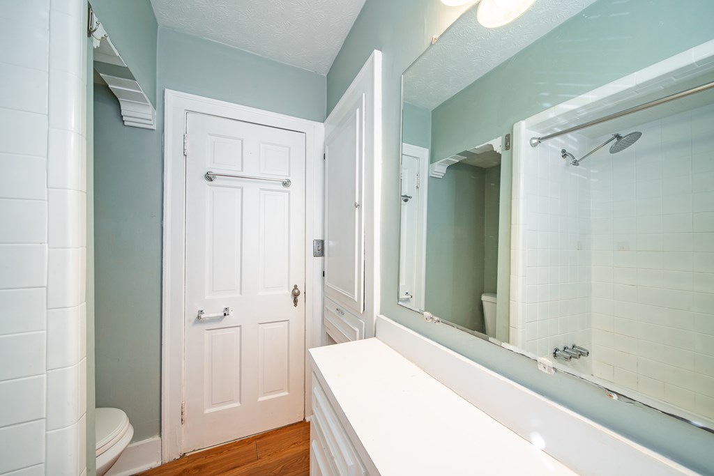 1705 Slade Drive Columbus, GA 31901 - Photo 25 of 37 a bathroom with a sink and a mirror