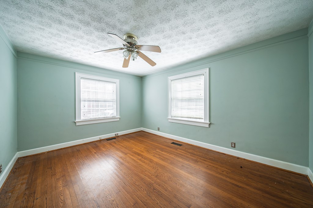 1705 Slade Drive Columbus, GA 31901 - Photo 28 of 37 a view of a room with wooden floor and windows