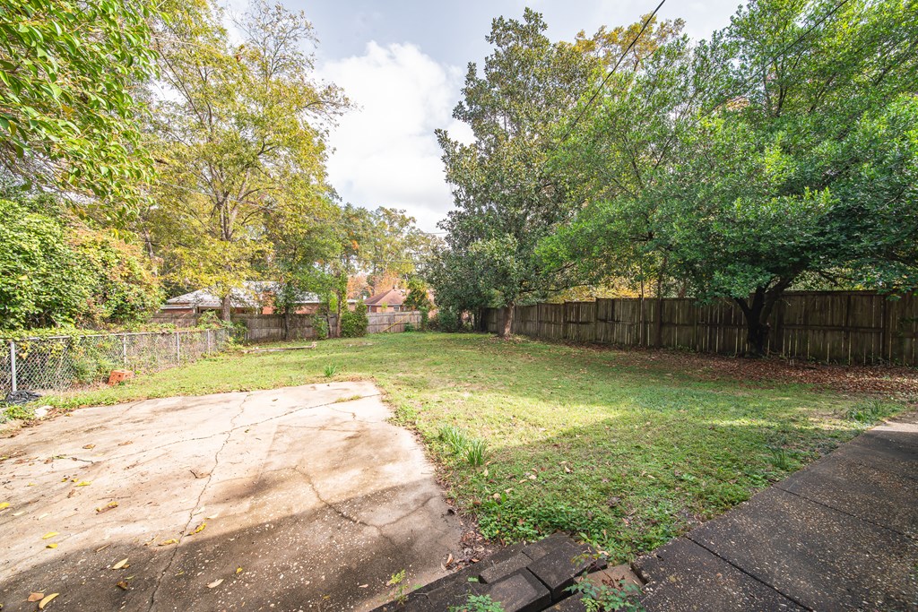 1705 Slade Drive Columbus, GA 31901 - Photo 33 of 37 a view of a yard with swimming pool
