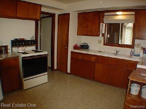 20034 Farmington Road Livonia, MI 48152 - Photo 7 of 25 kitchen view 2