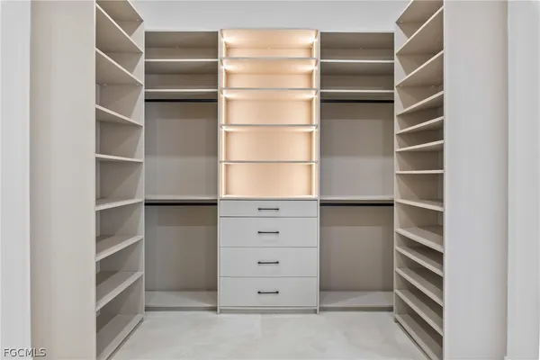 a view of an house with swimming pool and a porch