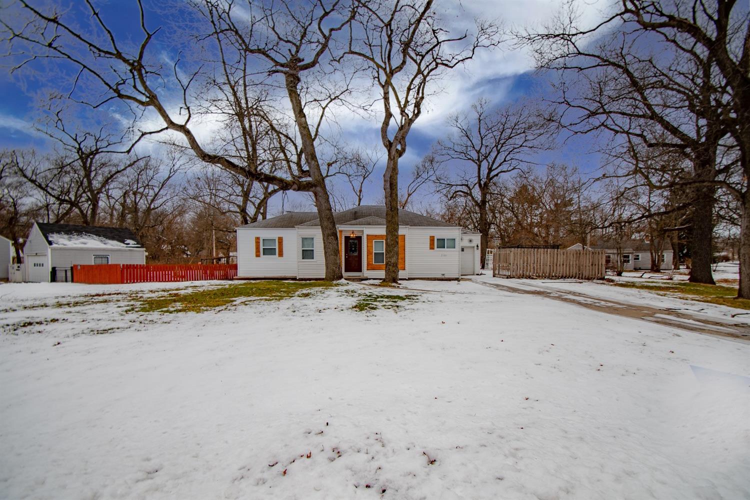 2100 Ranburn Drive Gary, IN 46408 - Photo 1 of 23 a view of road with large trees
