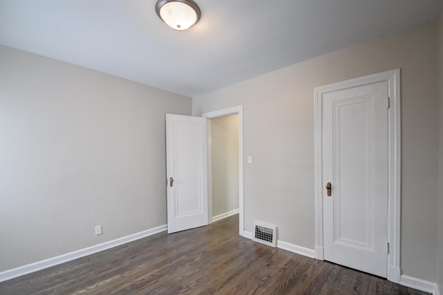 2100 Ranburn Drive Gary, IN 46408 - Photo 17 of 23 a view of an empty room with wooden floor