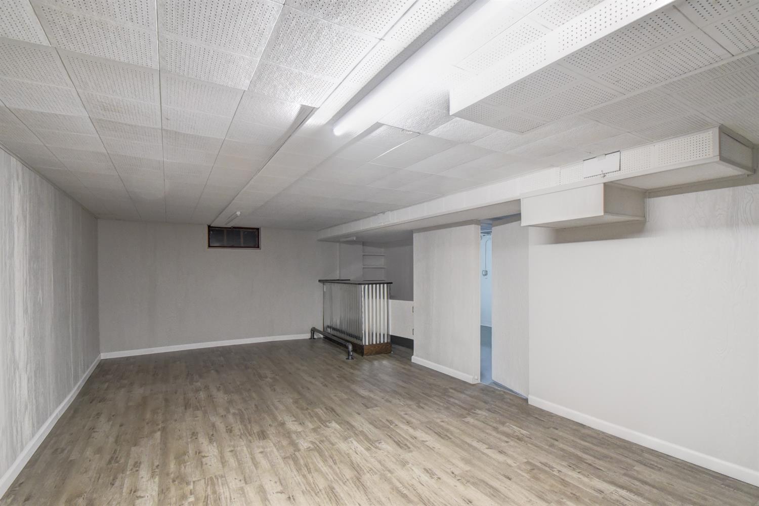 2100 Ranburn Drive Gary, IN 46408 - Photo 21 of 23 a view of empty room with wooden floor
