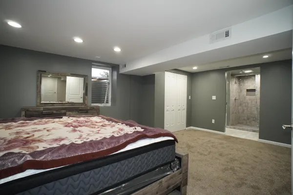 a bathroom with a sink and a large mirror