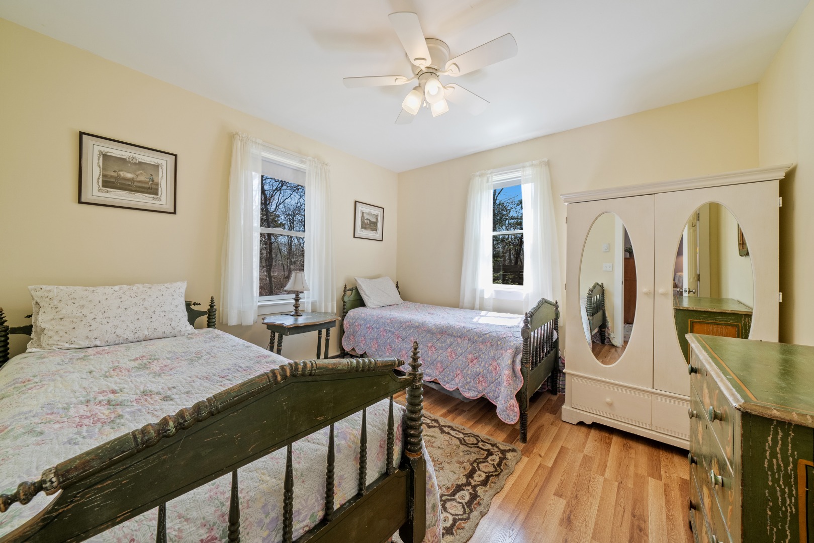 357 West Tisbury Road Edgartown, MA 02539 - Photo 27 of 33 a bedroom with a bed a potted plant and dresser