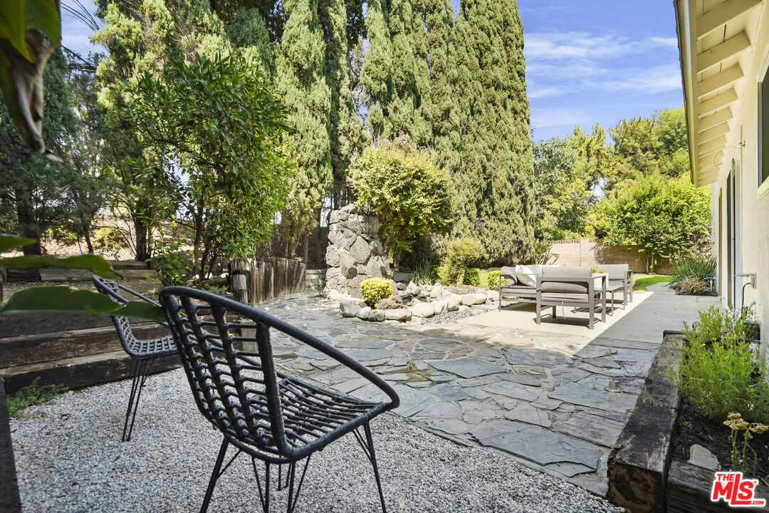 19009 Celtic Street Porter Ranch, CA 91326 - Photo 25 of 28 a view of a backyard with sitting area