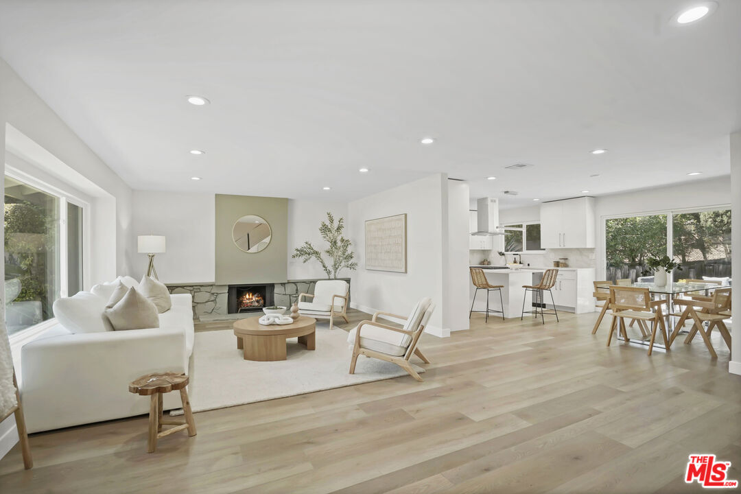 19009 Celtic Street Porter Ranch, CA 91326 - Photo 3 of 28 a living room with furniture and a table