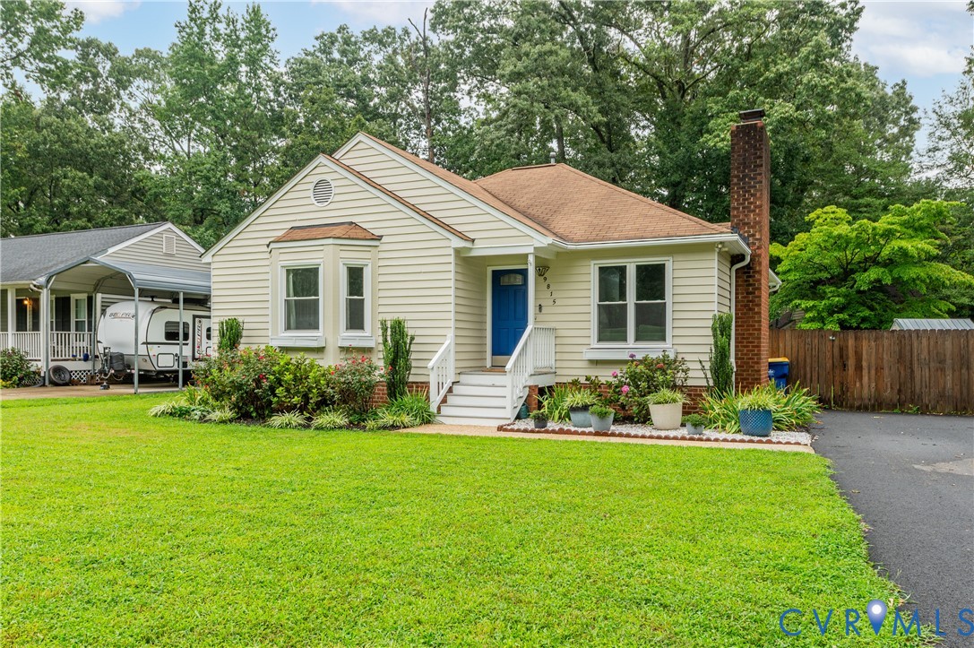 9815 Brenspark Road Chesterfield, VA 23832 - Photo 37 of 38 Cream-colored siding exterior with a contrasting b