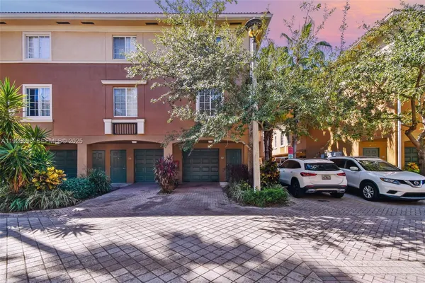 a view of a car park in front of a building