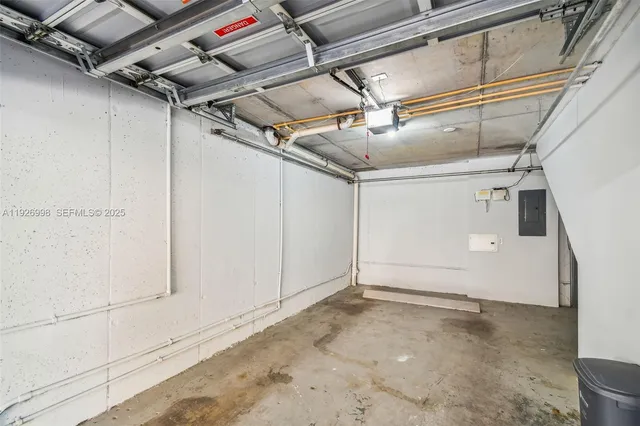 a view of a house with swimming pool and sitting area