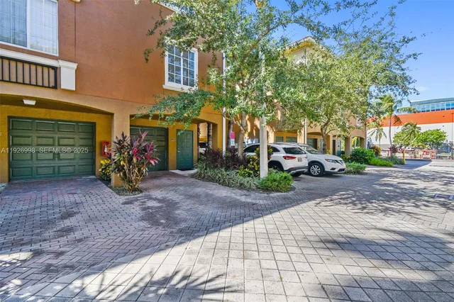 a view of a car park in front of a building
