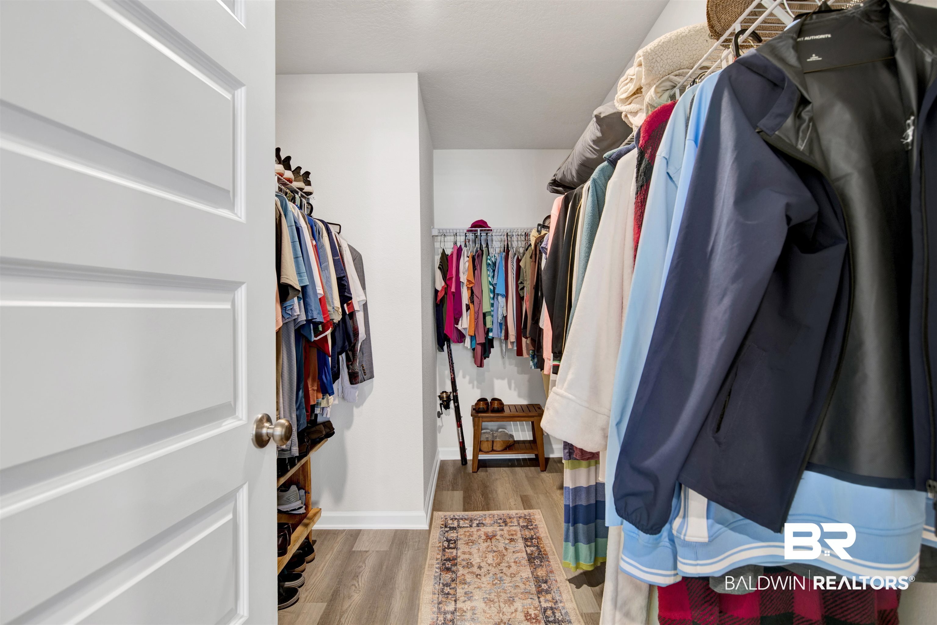 22348 Aleutian Avenue Foley, AL 36535 - Photo 18 of 32 Walk in closet with light wood finished floors