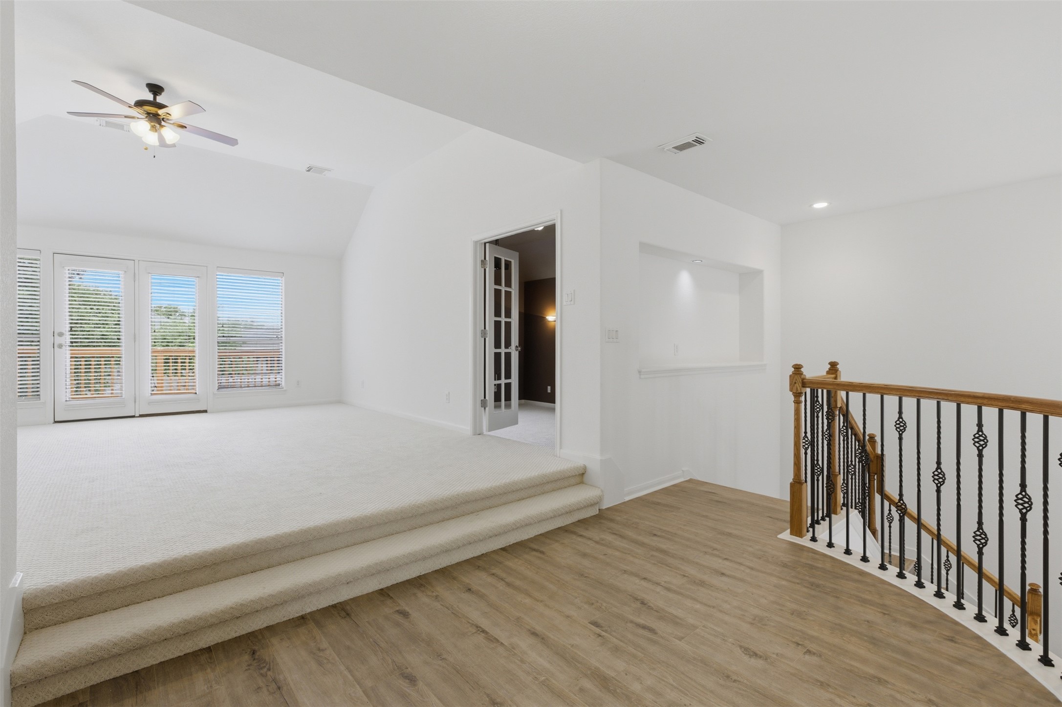 2909 Agave Loop Round Rock, TX 78681 - Photo 21 of 38 Game room with vaulted ceiling, a ceiling fan, and light wood-style floors