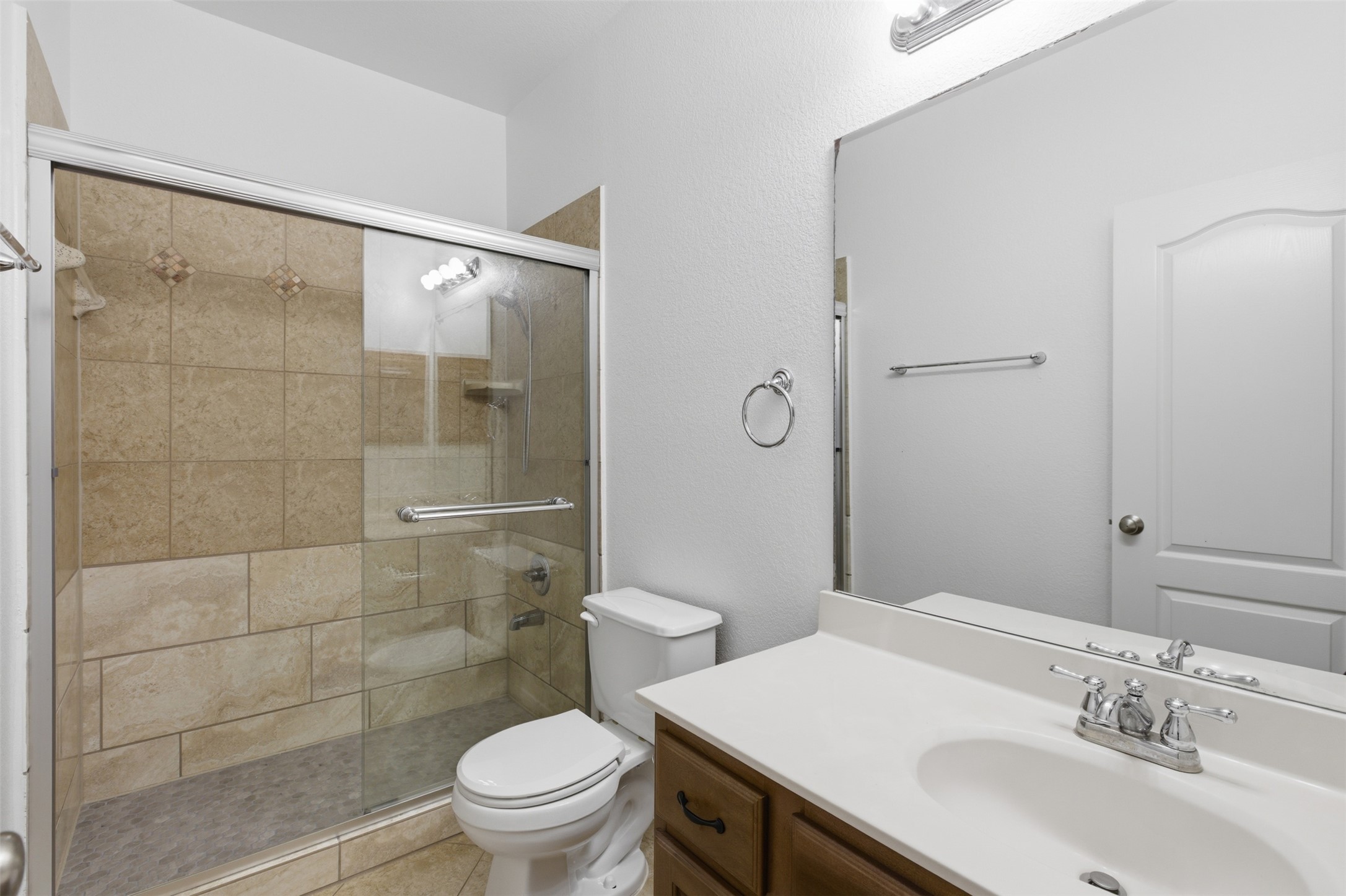2909 Agave Loop Round Rock, TX 78681 - Photo 7 of 38 Bathroom 2 with vanity and a shower stall