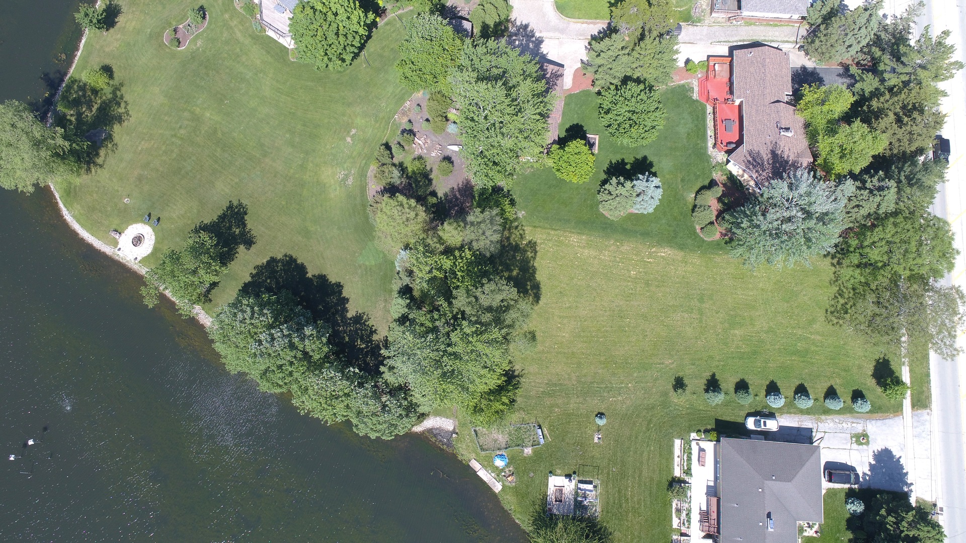 806 Plainfield Road Downers Grove, IL 60516 - Photo 5 of 16 an aerial view of lake with residential houses with outdoor space