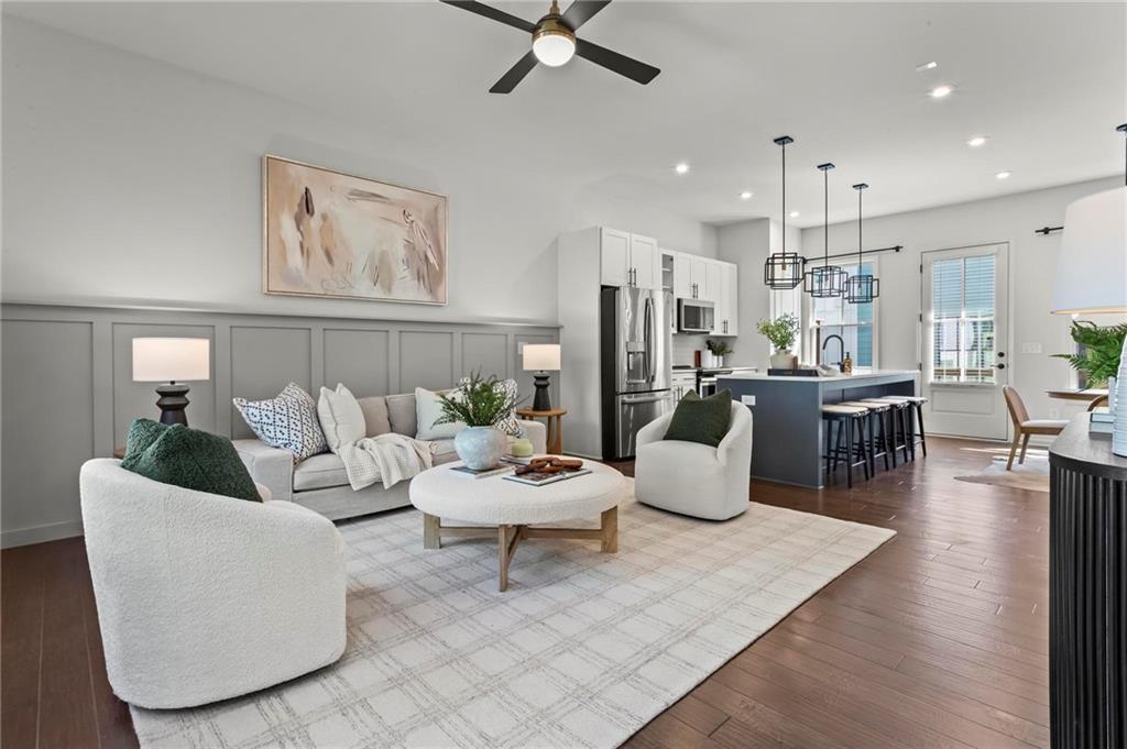 718 Needletail Way Atlanta, GA 30312 - Photo 14 of 44 a living room with furniture and a large window