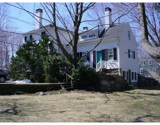 80 First Parish Road Scituate, MA 02066 - Photo 14 of 14 a front view of a house with a yard