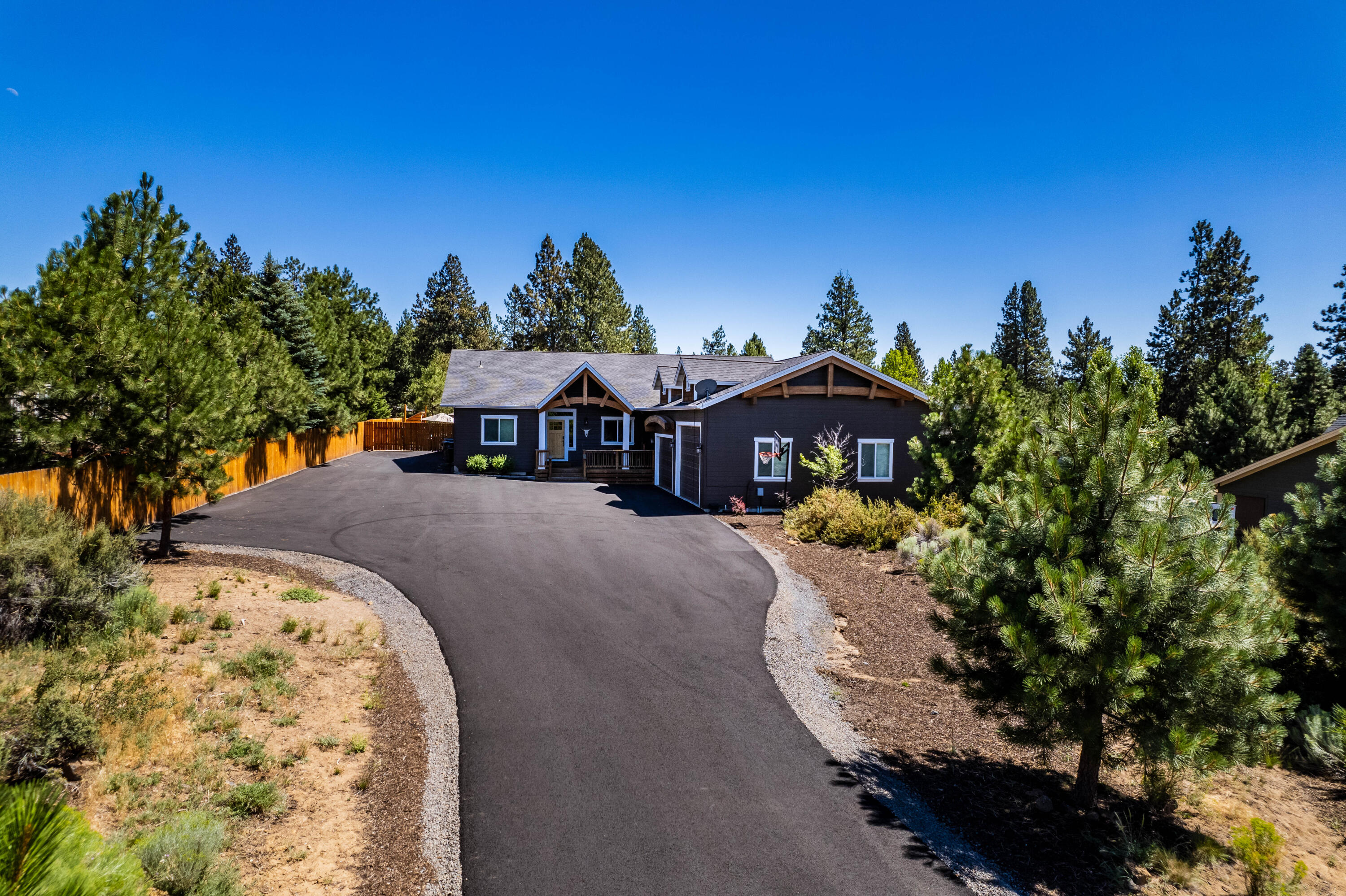 19525 Apache Road Bend, OR 97702 - Photo 1 of 47 a view of a street with a building in the background