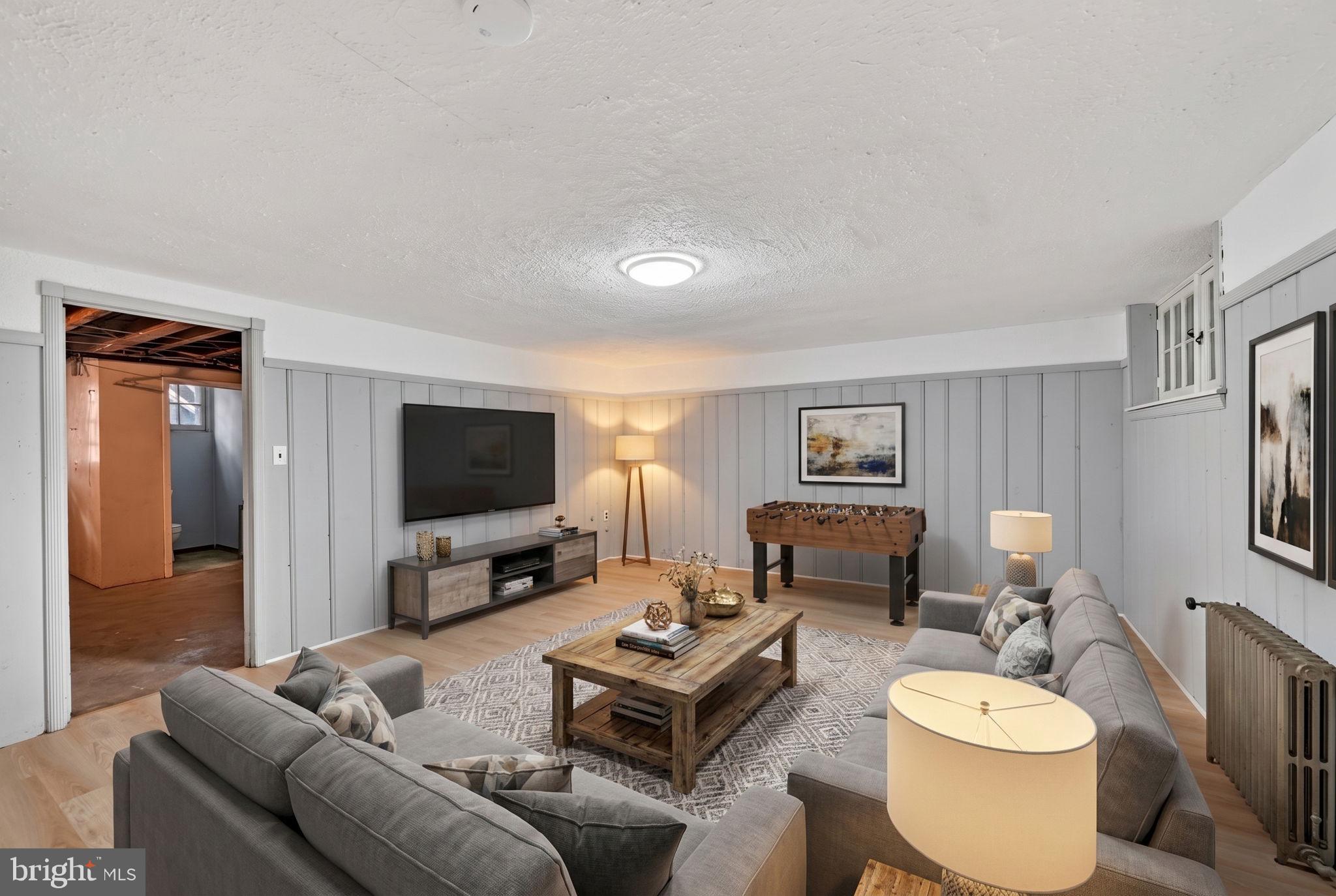 124 Dunkirk Road Baltimore, MD 21212 - Photo 29 of 42 Virtually Staged Lower Level Family Room