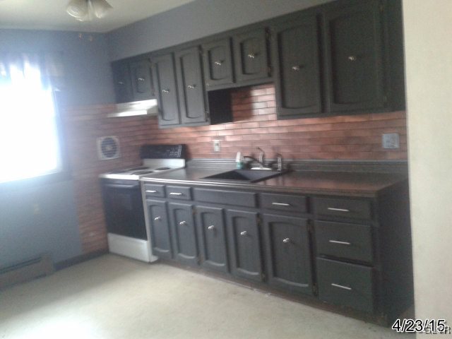 521 Cherry Hill Road Nazareth, PA 18064 - Photo 11 of 21 a kitchen with stainless steel appliances granite countertop a sink and cabinets
