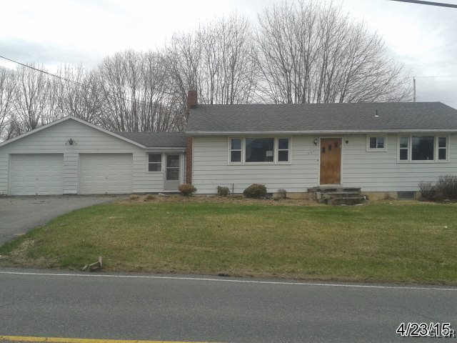 521 Cherry Hill Road Nazareth, PA 18064 - Photo 2 of 21 a front view of a house with a garden