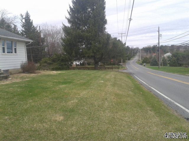 521 Cherry Hill Road Nazareth, PA 18064 - Photo 3 of 21 a view of a big yard with an tree