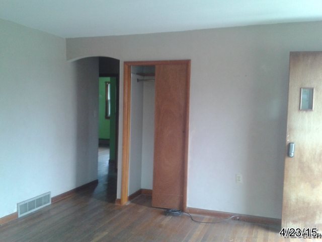 521 Cherry Hill Road Nazareth, PA 18064 - Photo 10 of 21 an empty room with wooden floor and windows