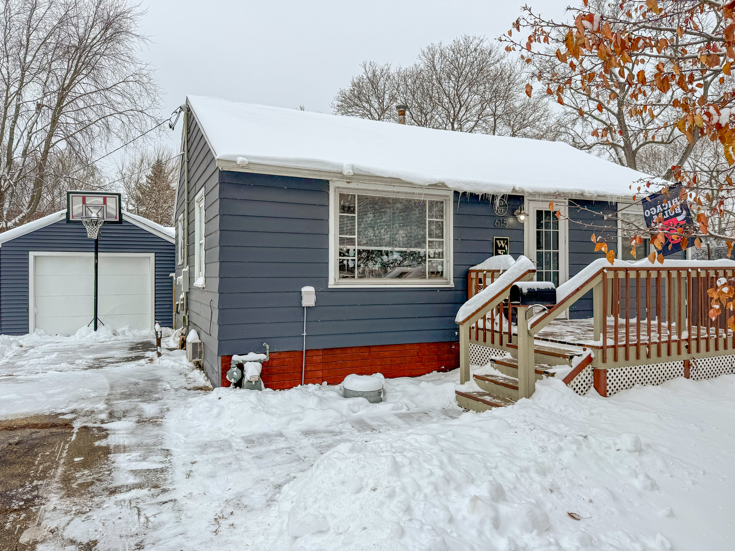 615 West 9th Street Sterling, IL 61081 - Photo 2 of 30 a view of a house with backyard and sitting area