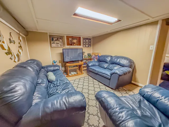 a living room with furniture and a couch