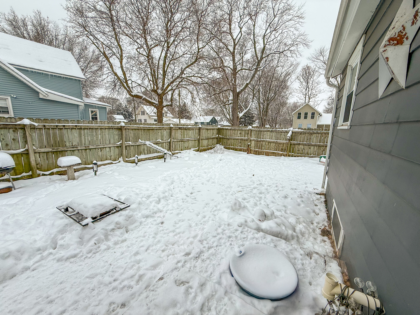 615 West 9th Street Sterling, IL 61081 - Photo 28 of 30 a view of a backyard of snow