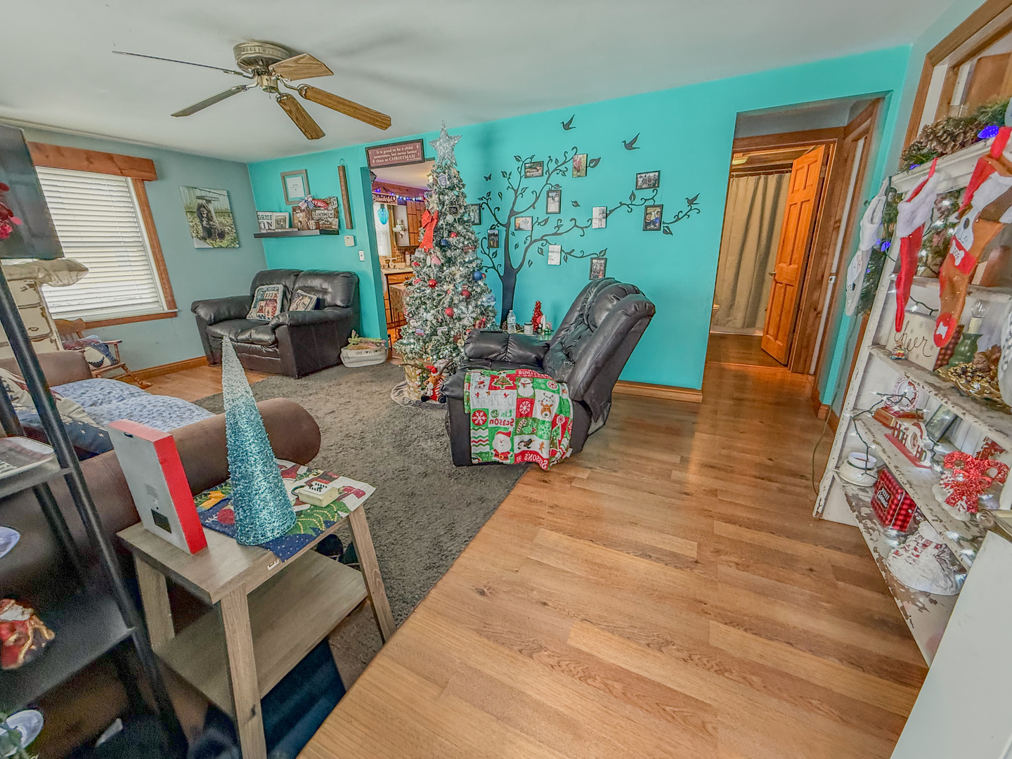 615 West 9th Street Sterling, IL 61081 - Photo 5 of 30 a living room with furniture and a flat screen tv