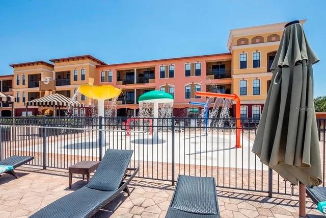 a view of a balcony with wooden floor