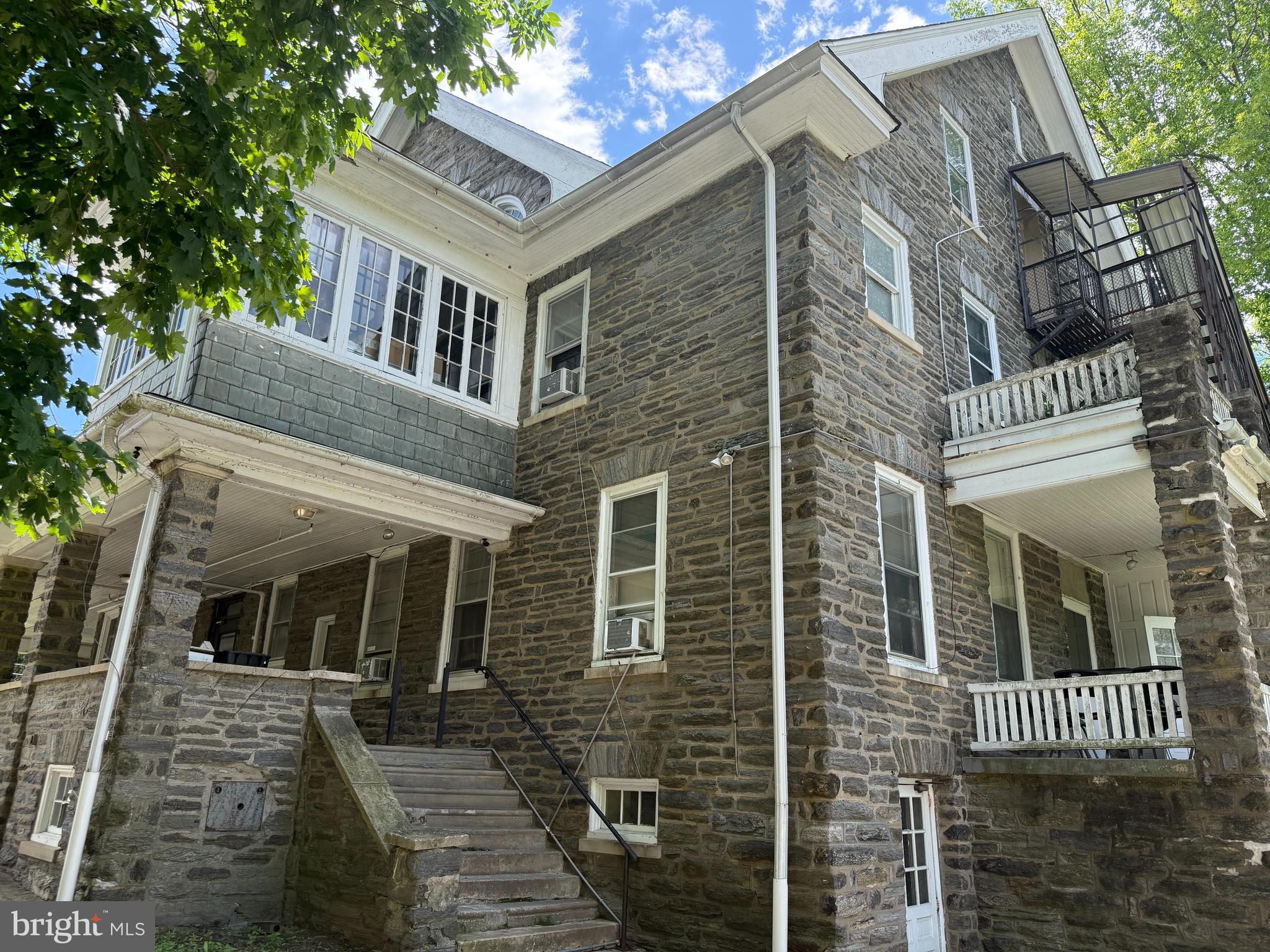 31 West Mill Road Flourtown, PA 19031 - Photo 5 of 12 front view of a house with a door