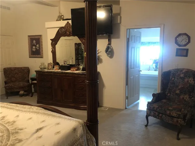 a kitchen with sink cabinets and window