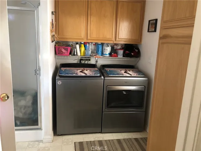 a kitchen with a stove and a refrigerator