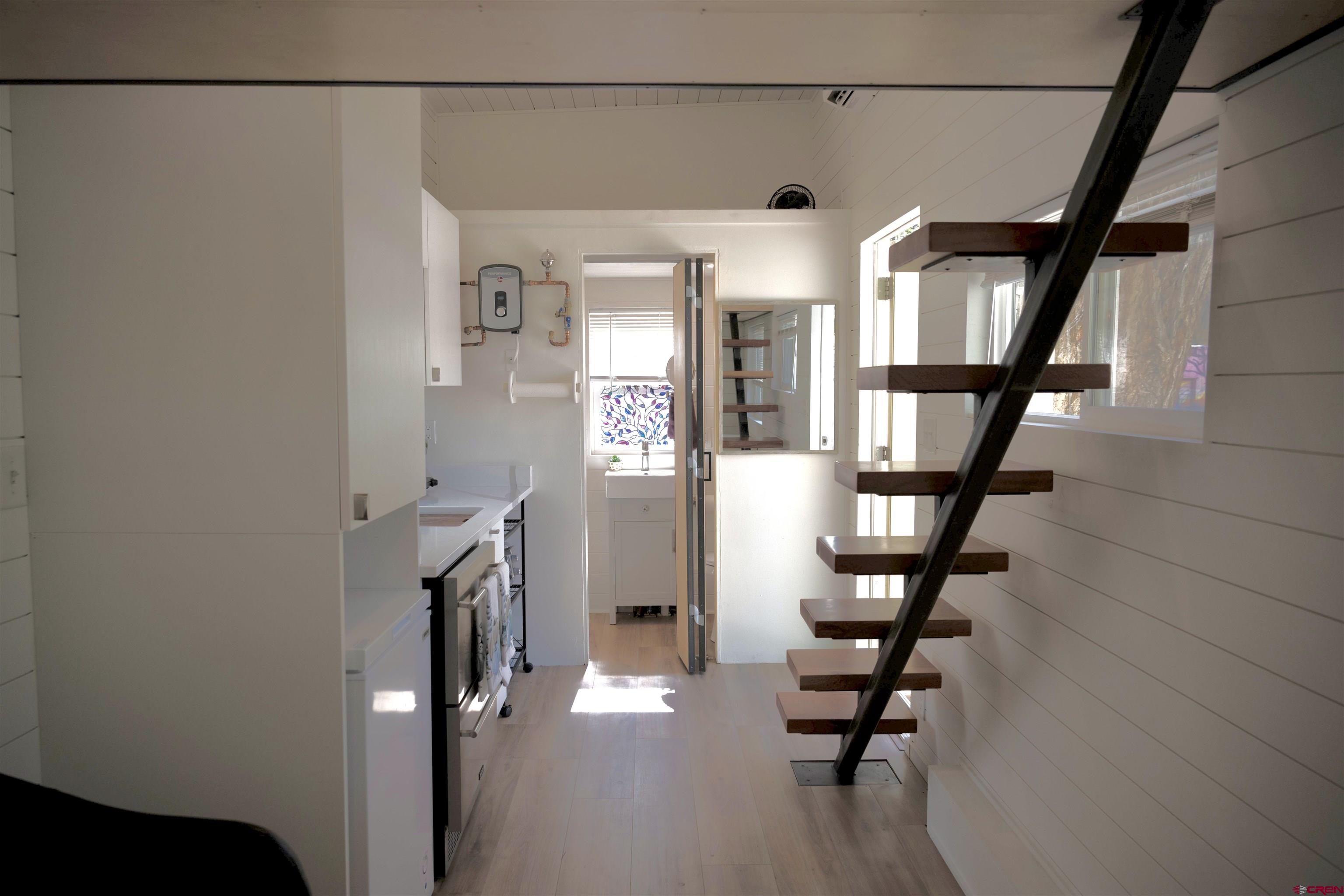 485 Florida Road, Unit C23 Durango, CO 81301 - Photo 12 of 22 a view of entryway with stairs and wooden floor