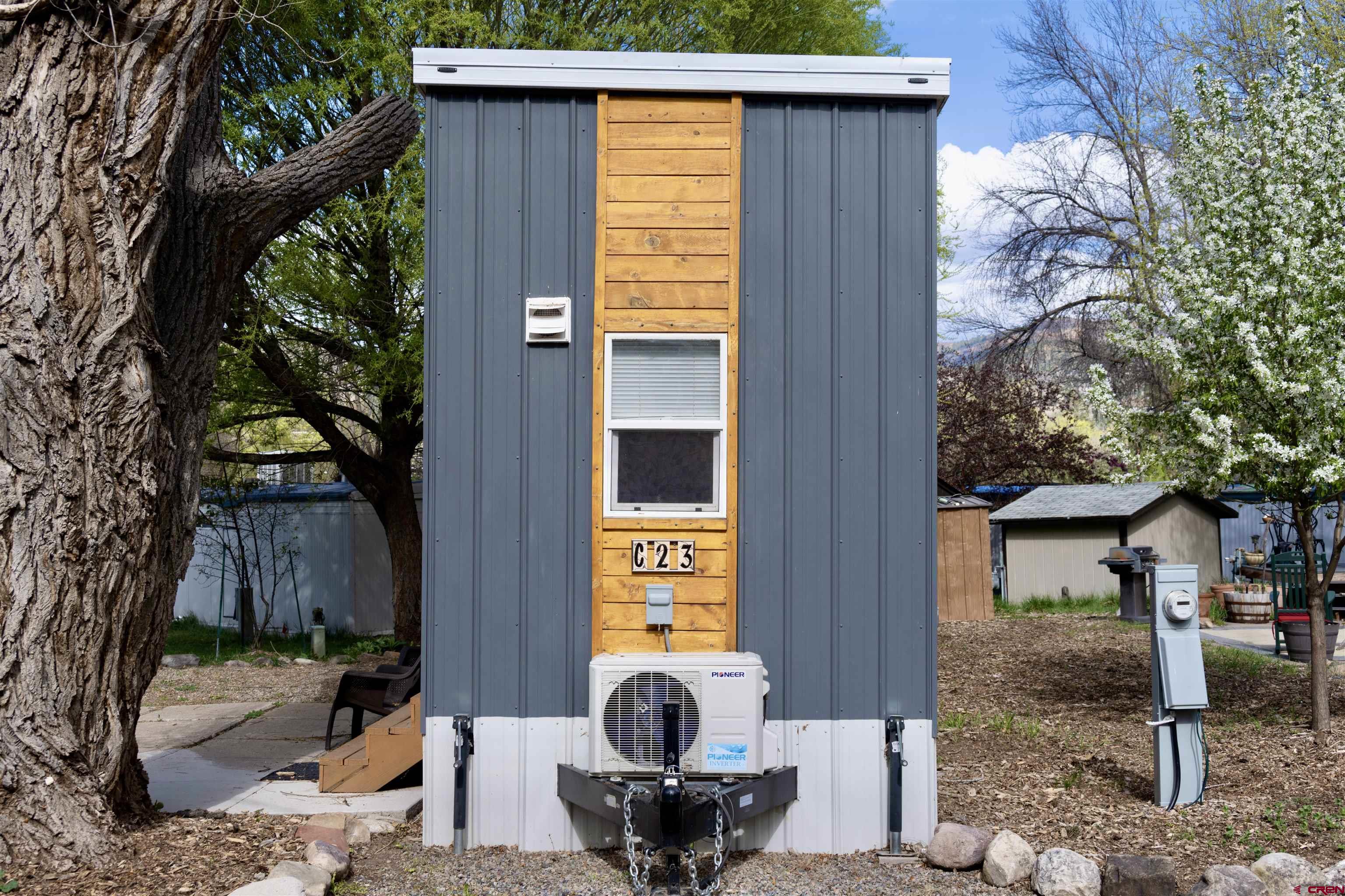 485 Florida Road, Unit C23 Durango, CO 81301 - Photo 2 of 22 a view of a house with backyard and sitting area