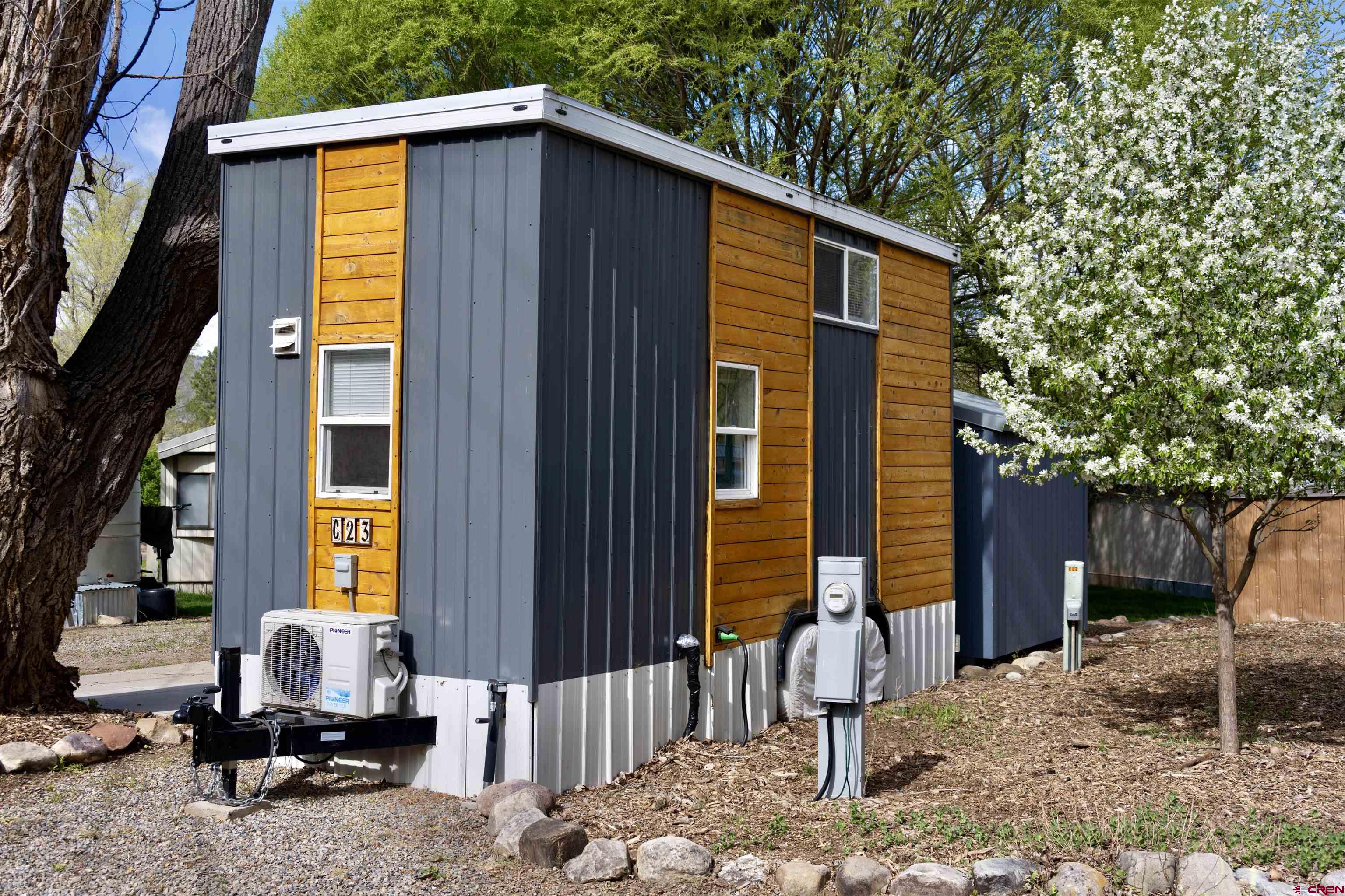 485 Florida Road, Unit C23 Durango, CO 81301 - Photo 4 of 22 a front view of a house with outdoor seating