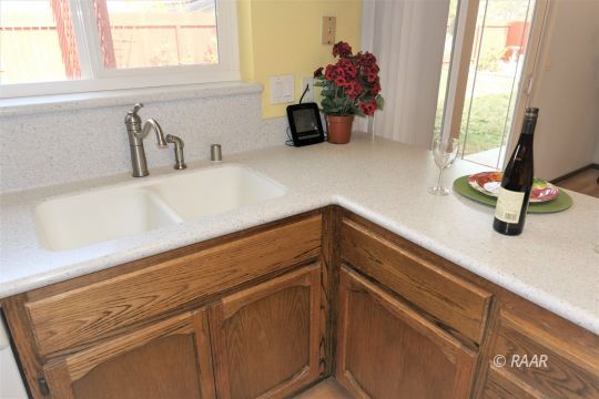 412 Veada Avenue Ridgecrest, CA 93555 - Photo 11 of 35 a close view of sink and tap