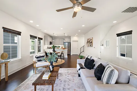 a living room with furniture or window and a wooden floor
