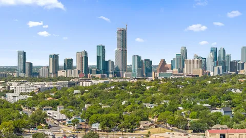 a view of a city with tall buildings